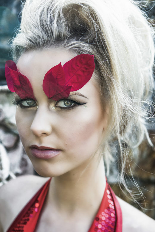 red leafes beautiful makeup on Taylah model in the fashion Editorial