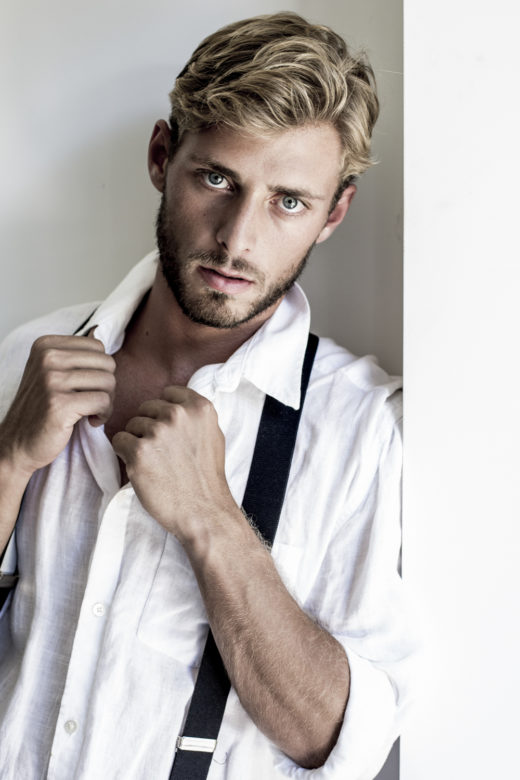 portrait of Male model's portfolio with suspenders