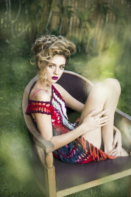 model on chair red lips for Byron bay’s Most Popular beauty  Photographer