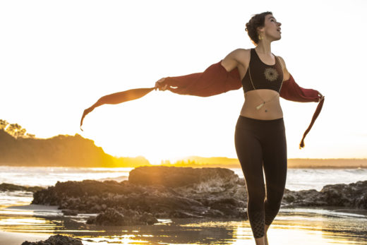 yoga mandala clothes for yoga model  on sunset in Byron Bay