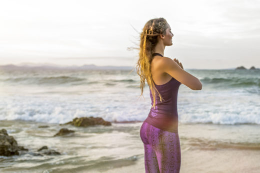 yoga mandala clothes for yoga model  on sunset in Byron Bay